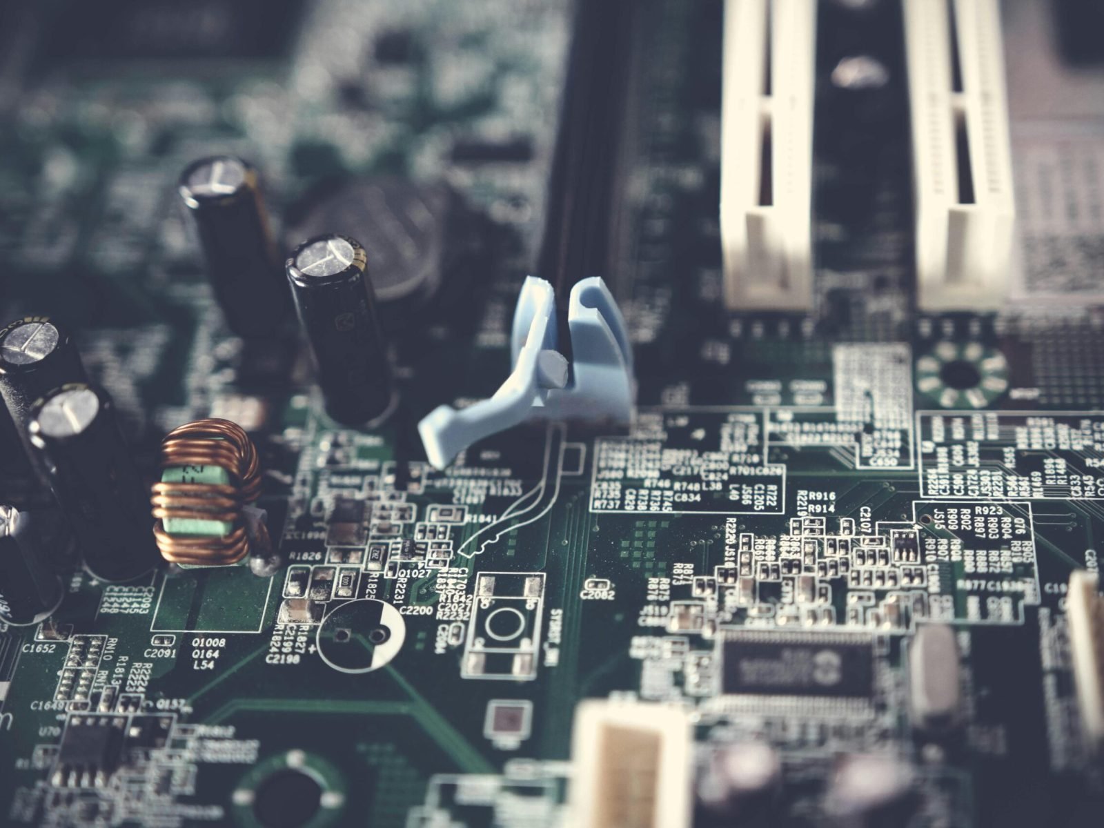 pexels-photo-1432794-1432794 Detailed view of components on a computer motherboard, showcasing technology and circuitry.